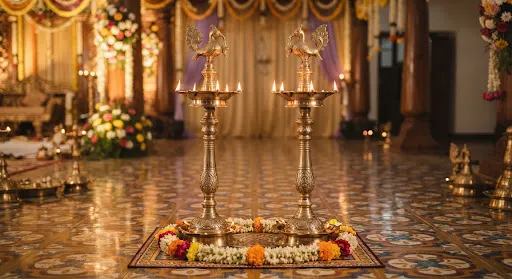 Brass kuthuvilakku floor lamps glowing with pure cow ghee